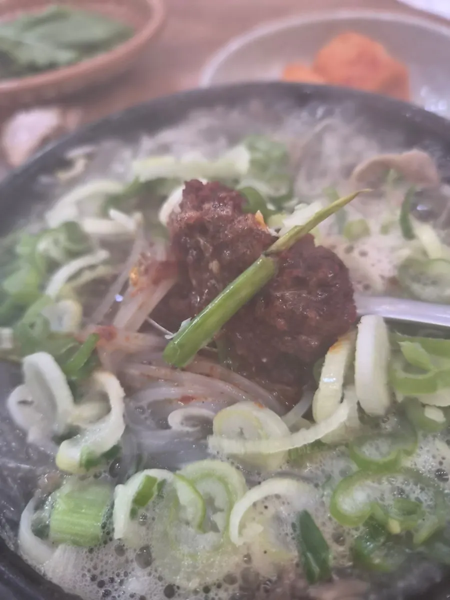 Haejangguk piled generously in a stone bowl