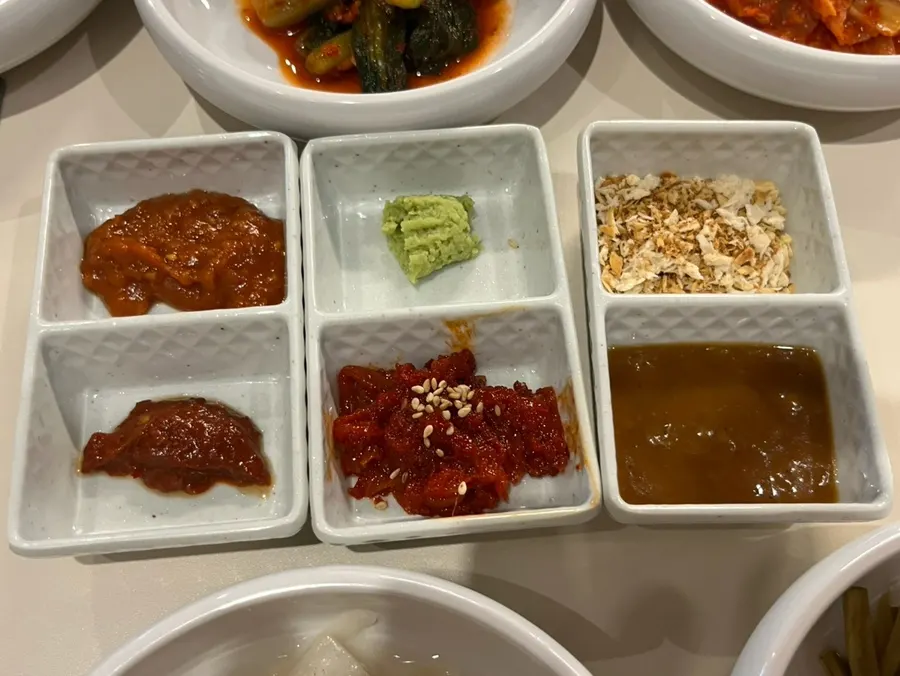 Kimchi side dishes and assorted sauces