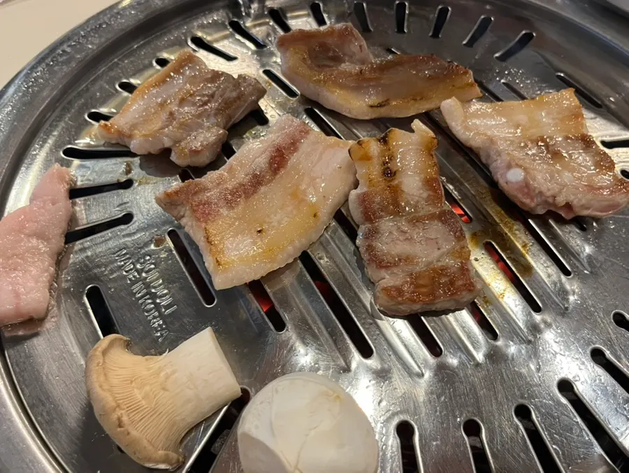 Close-up of raw pork belly on a plate