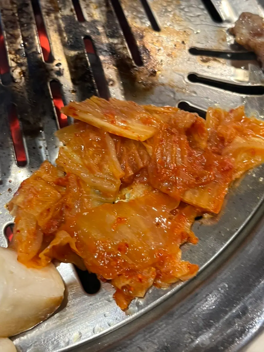 Well-cooked pork belly with king oyster mushrooms