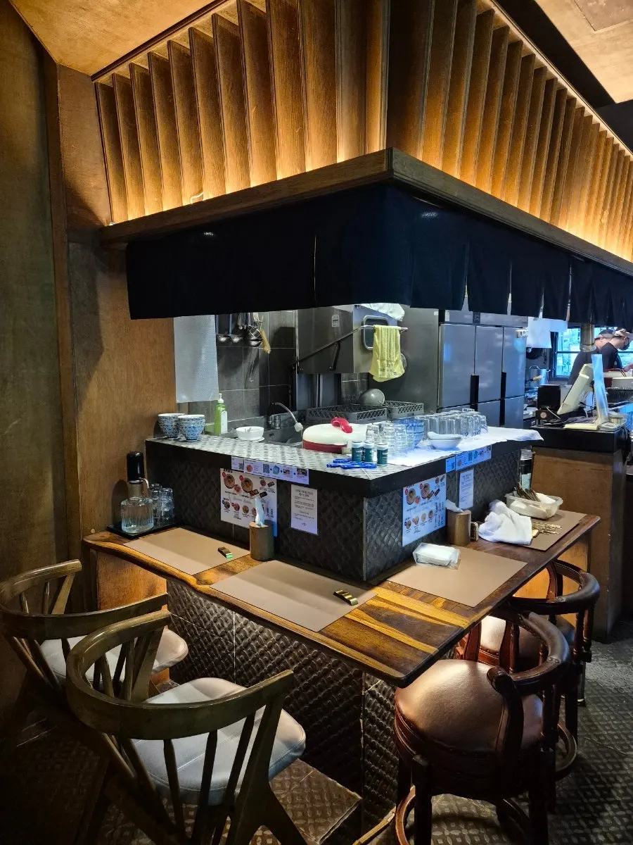 2-person and 4-person tables inside Sanbandeul Pork Gukbap