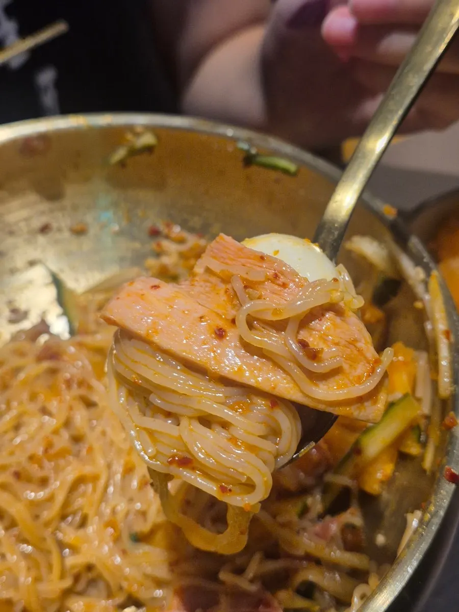 Bibim milmyeon mixed with meat on top