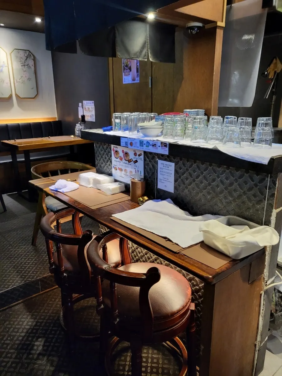 Additional seating area further inside the restaurant