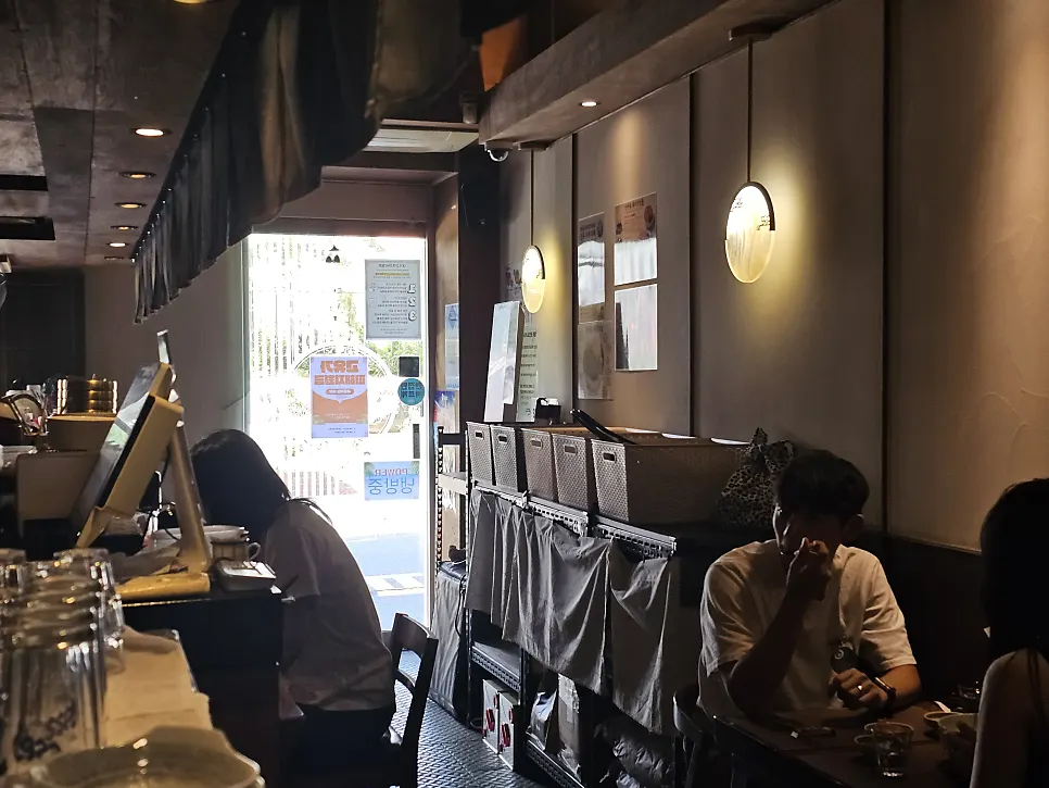Dachi bar seats at Sanbandeul Pork Gukbap, great for solo dining