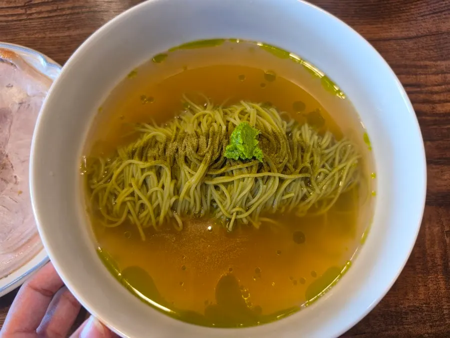 Close-up of the warm matcha onmyeon broth