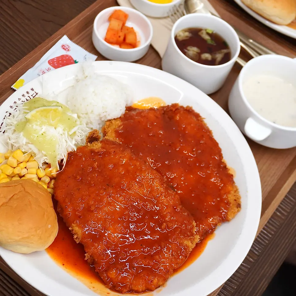 Classic gyeongyangsik pork cutlet topped generously with brown sauce