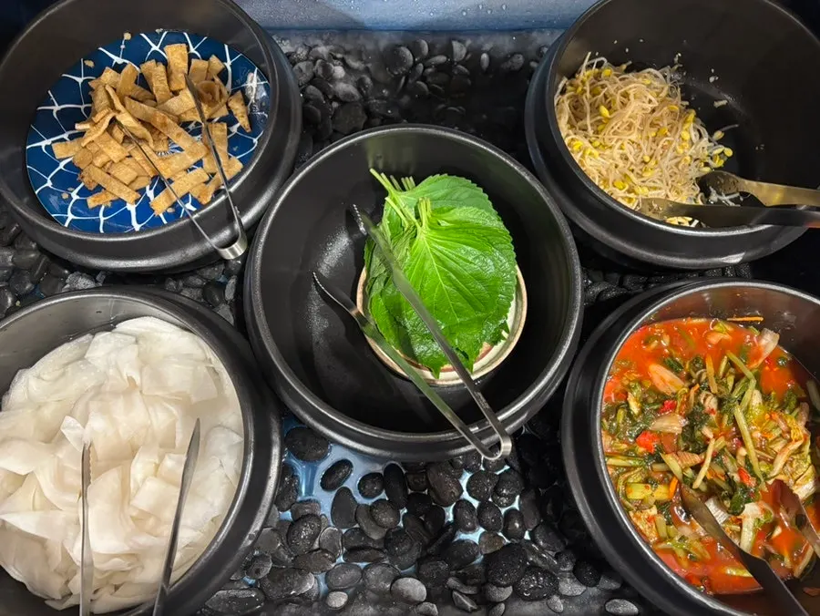Self-serve bar stocked with basic banchan