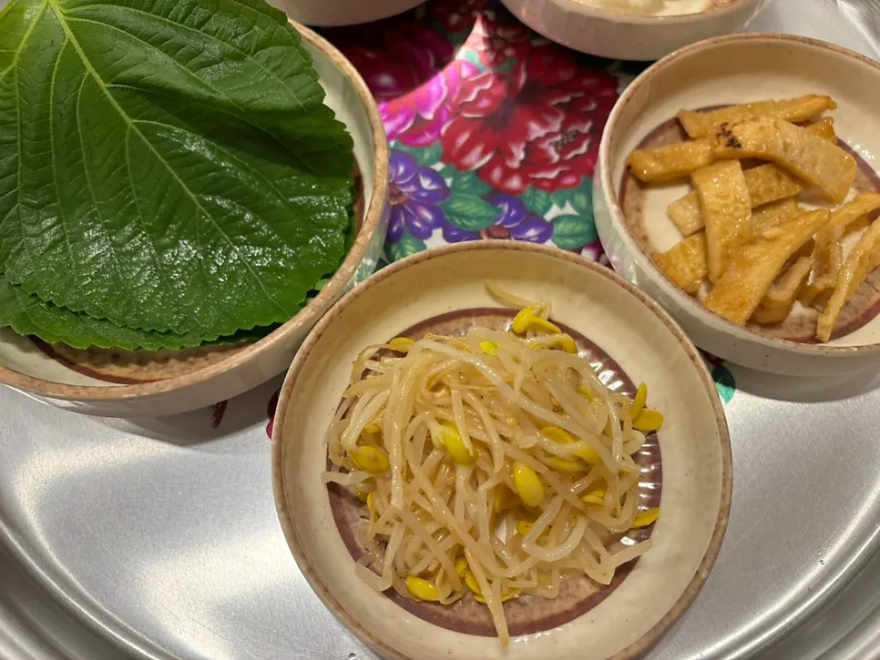 Stir-fried fish cake and yeolmu kimchi at the self-serve bar