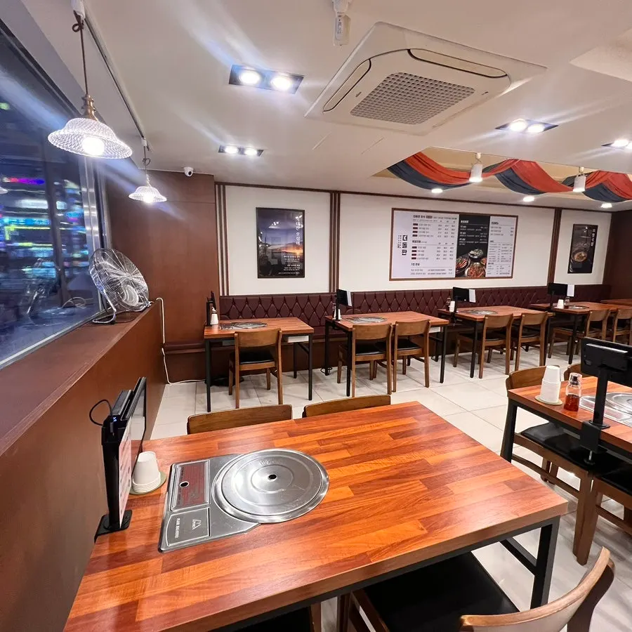 Dining hall at Deodolpan Sanbon Branch with roomy table spacing