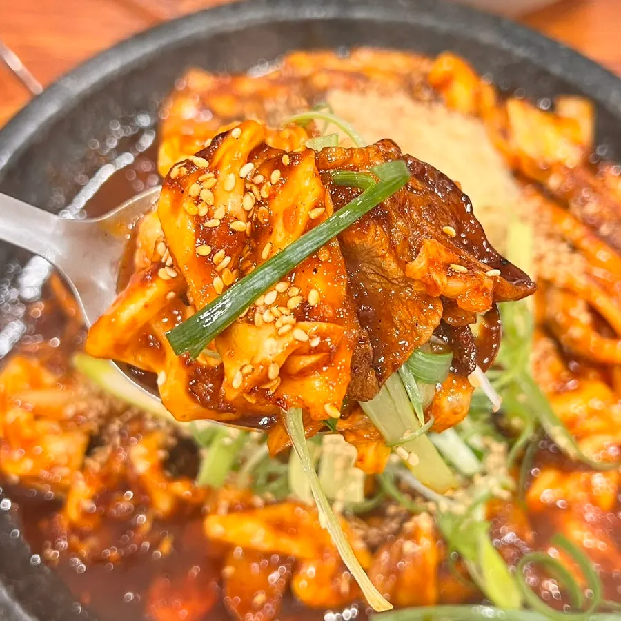 Pork stir-fry with big chunks of squid