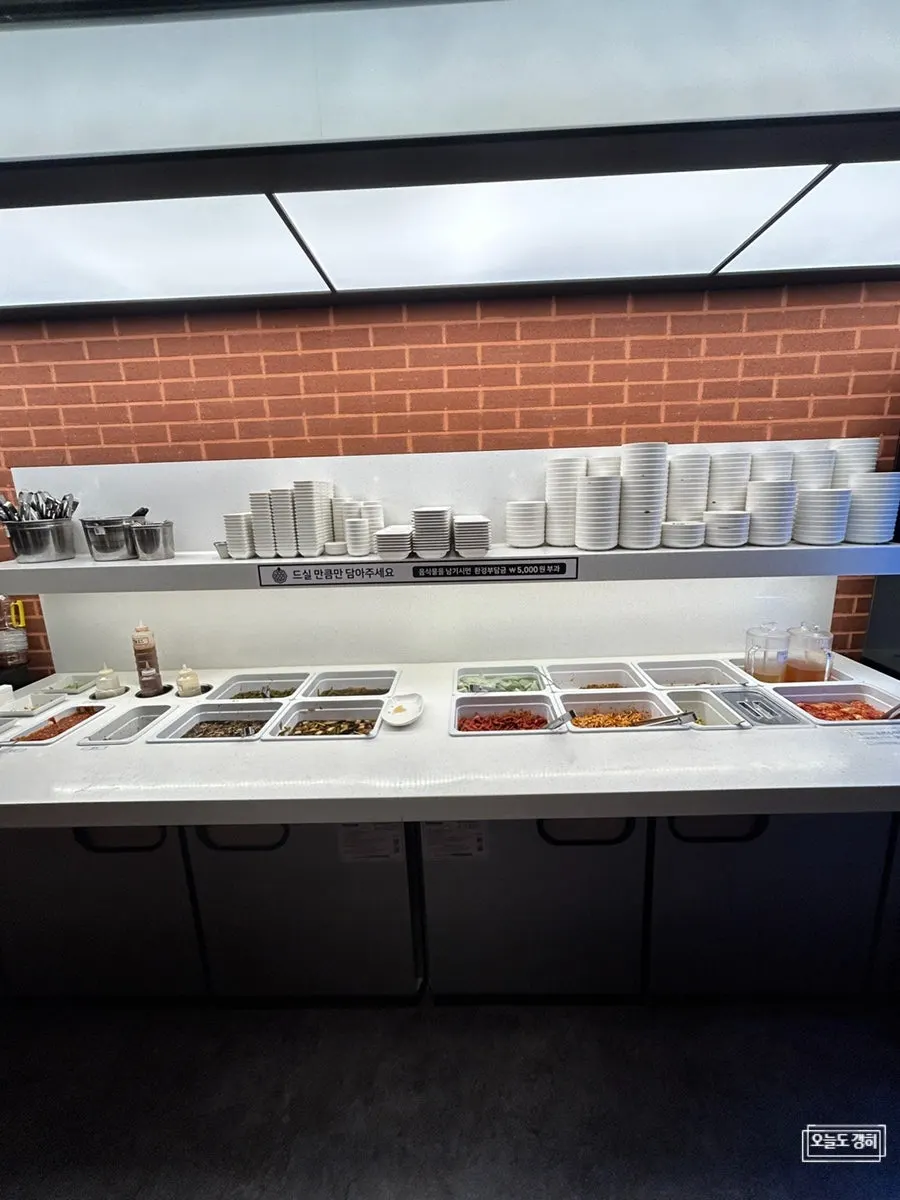 The Geobugi Dongne self-serve bar stocked with side dishes