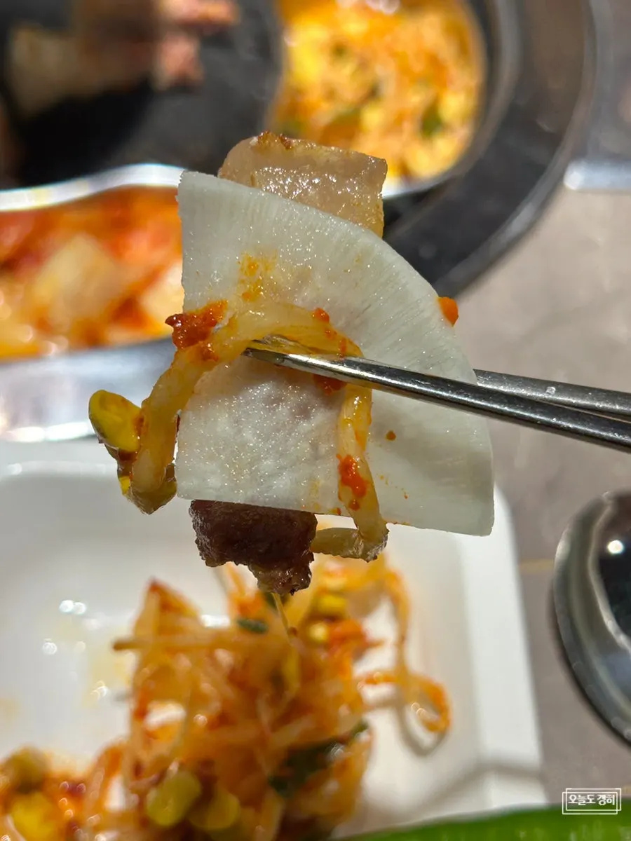 Close-up of jjolmyeon well mixed with plenty of sauce