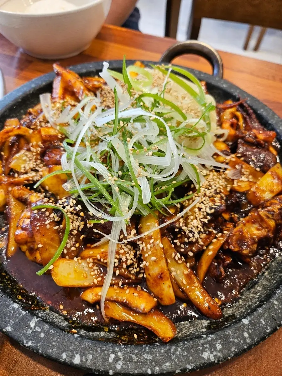 Oje Bokkeum set on a stone platter