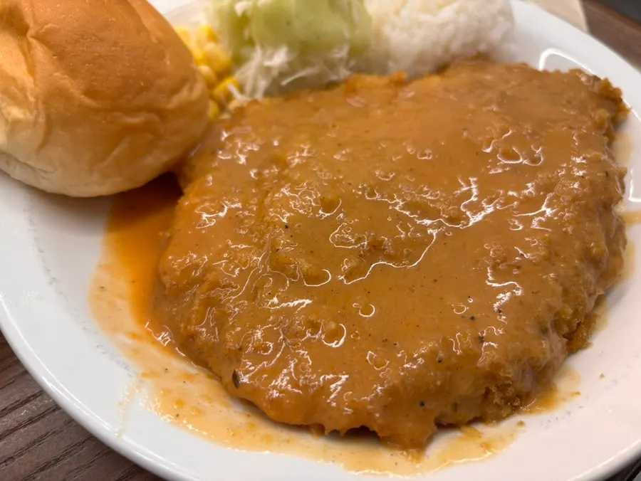 Gyeongyangsik pork cutlet piled high with sauce