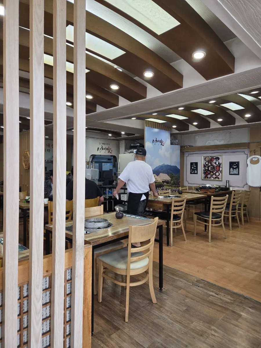 Wood-furnished interior of Sanchaega Hanjeongsik