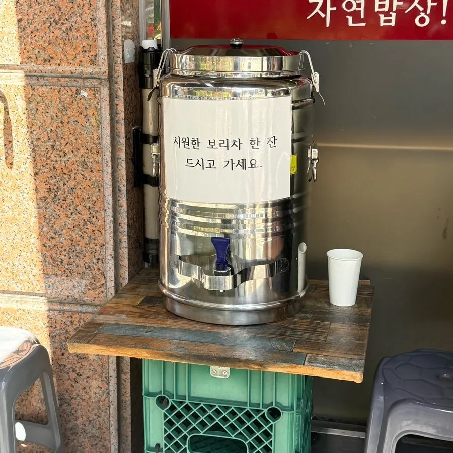 Waiting area with chairs and barley tea prepared