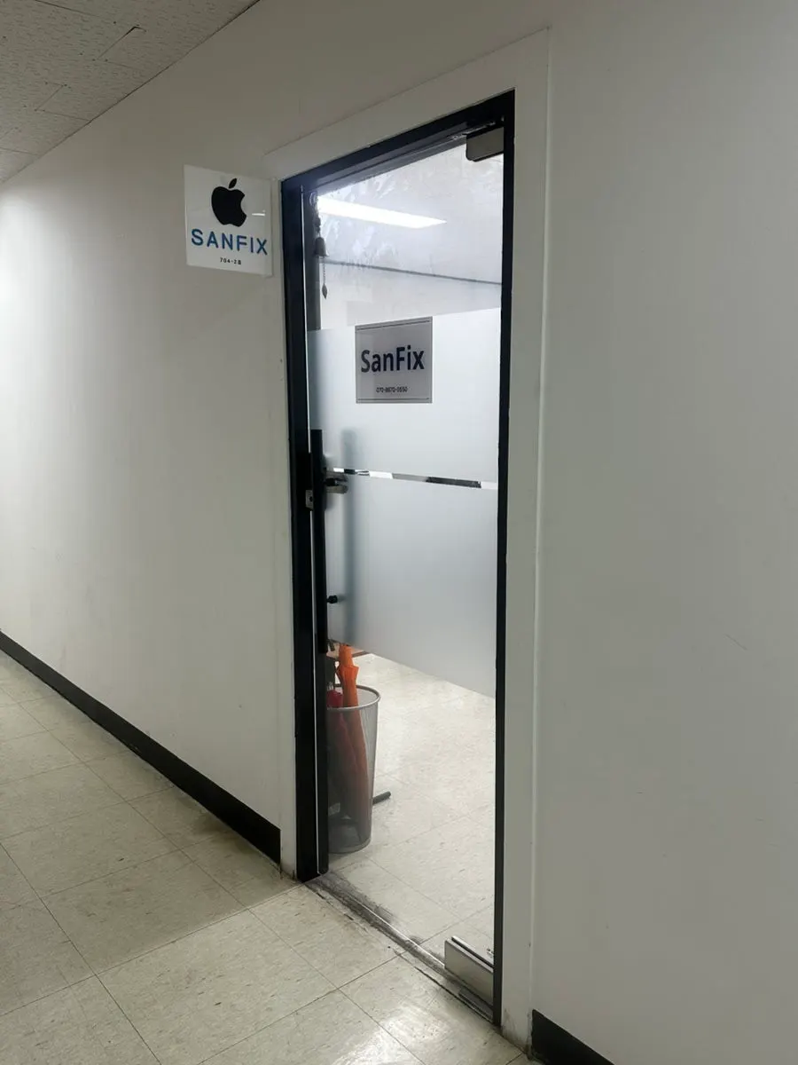 Signage for SANFIX on the 7th floor of the BYC Building