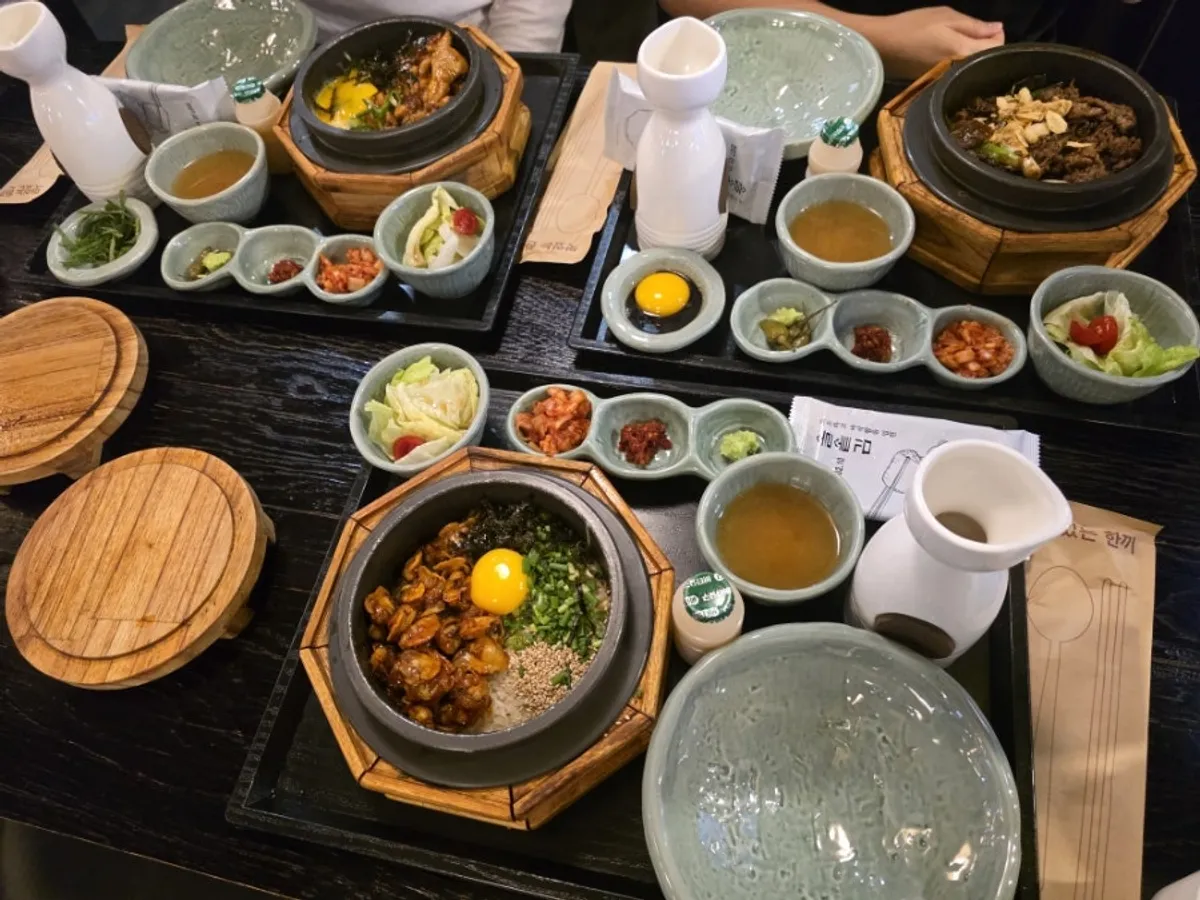 Full spread of three pot rice dishes at Solsot Sangam Branch