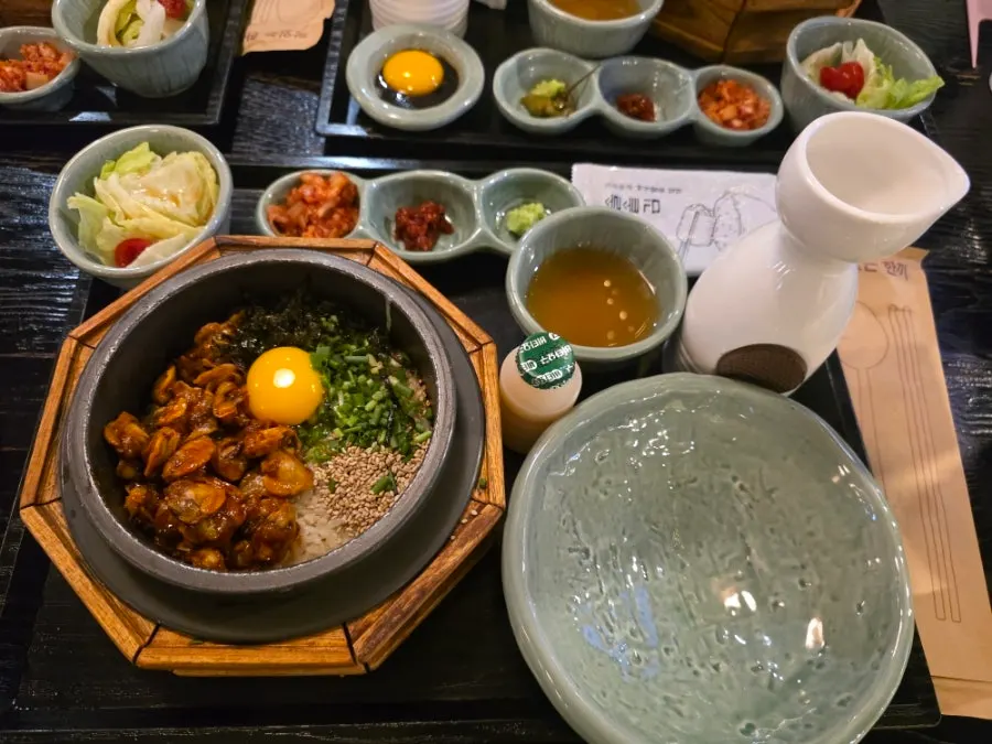 Cockle pot rice piled generously with cockles