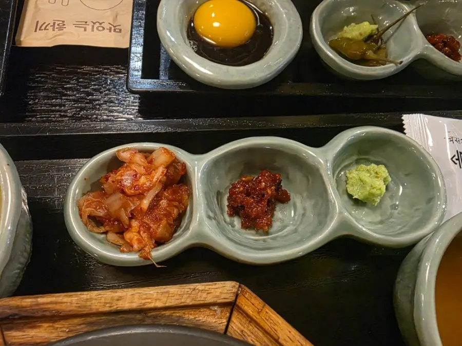 Cabbage salad with kimchi, wasabi, and seasoned dried seaweed