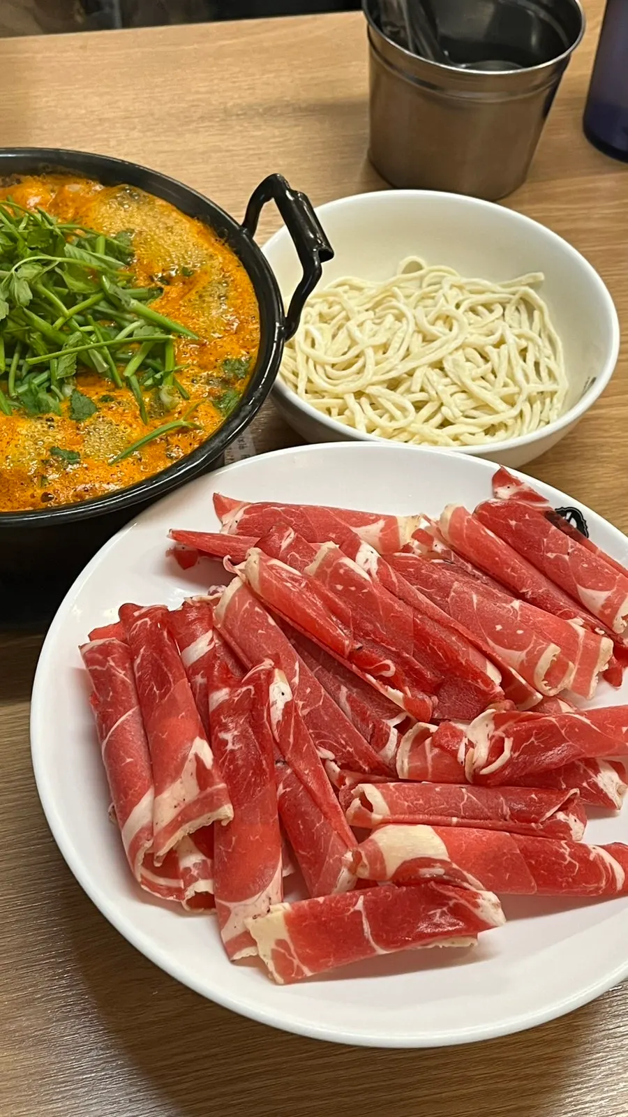 Menu board and prices at Deungchon Shabu Kalguksu Sangam Branch