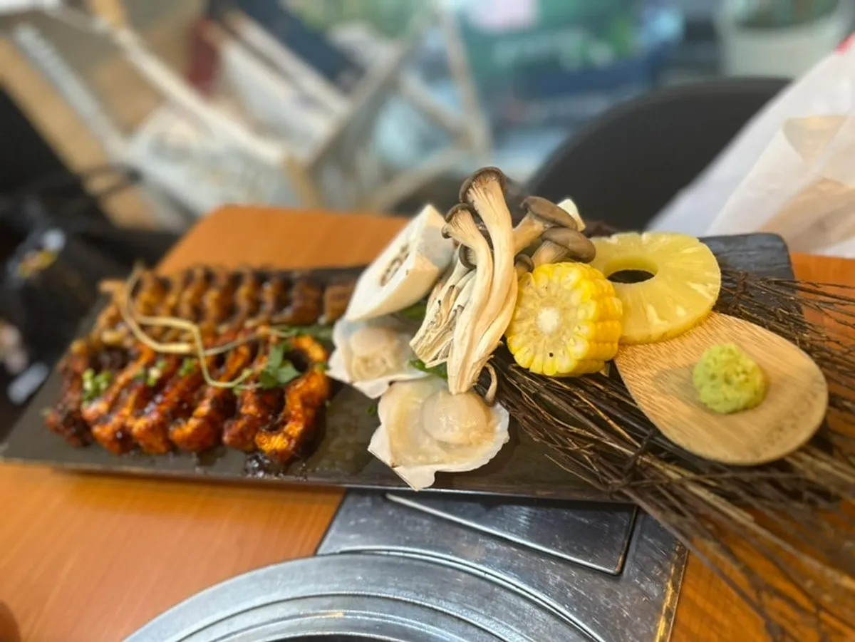 Grilled eel meal served with vegetables