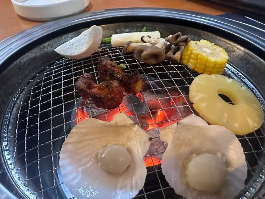 Grilled eel with scallops, fruit, and vegetables