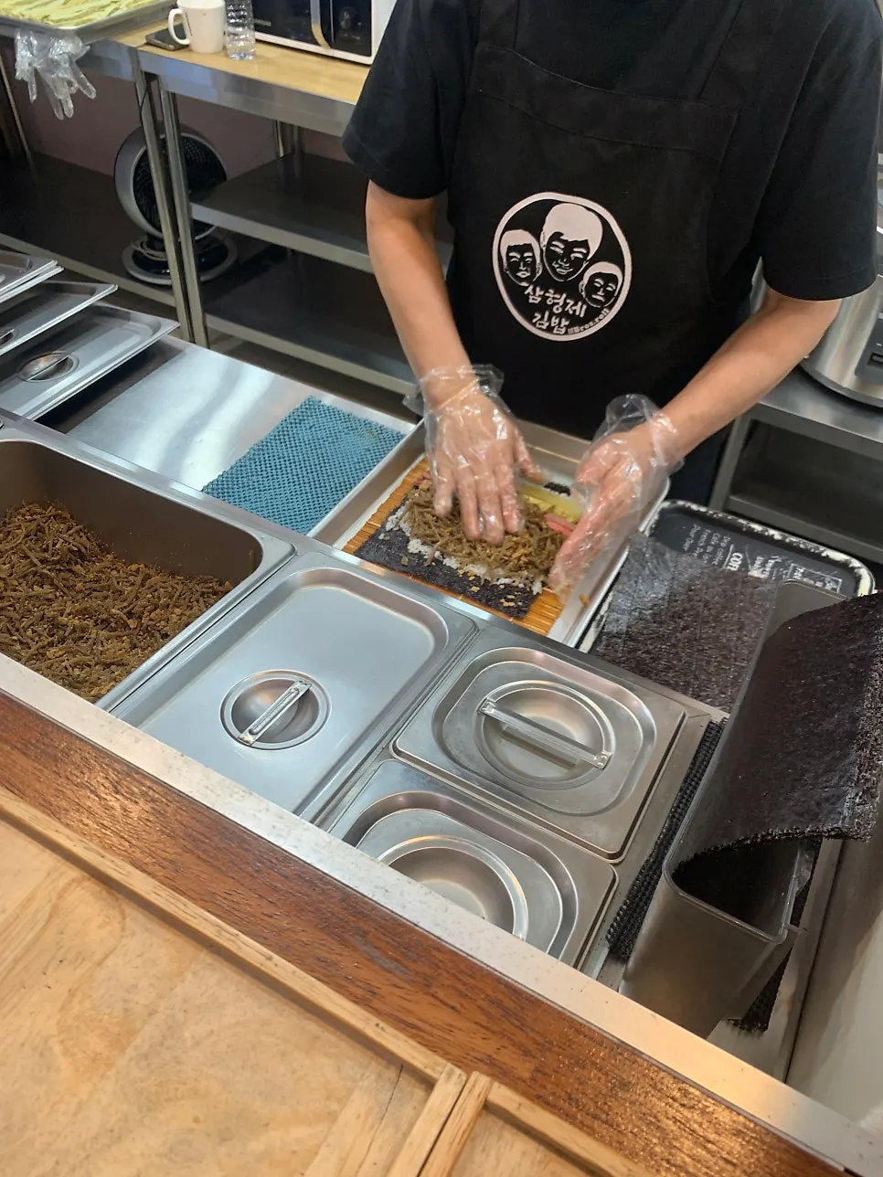 Gimbap being rolled fresh on the spot
