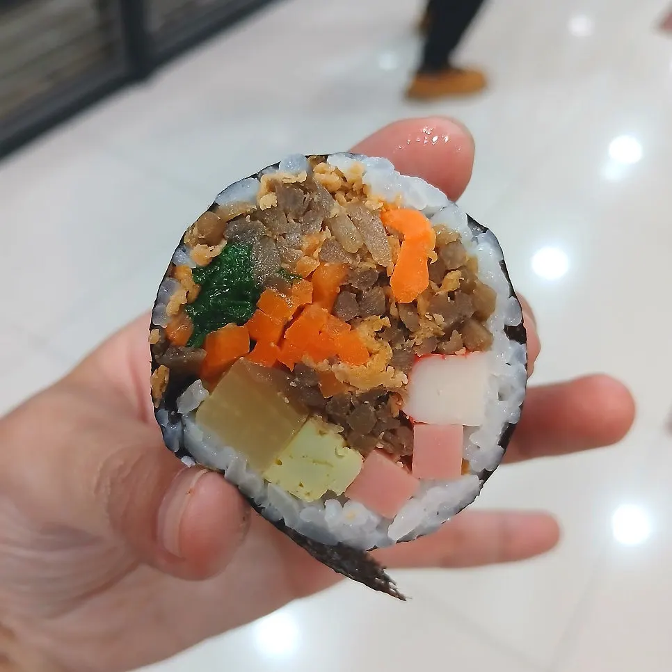 Cross-section of a densely filled yubu gimbap