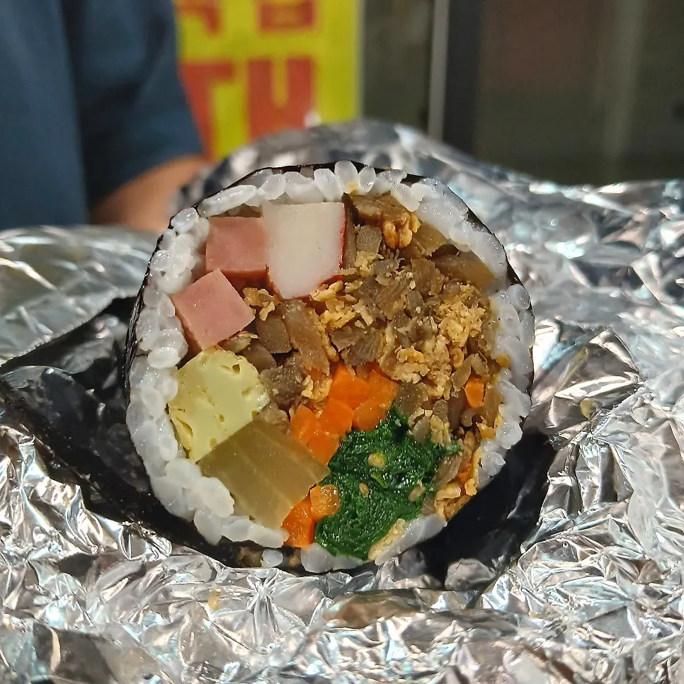 Close-up of a ham-crab stick yubu gimbap roll
