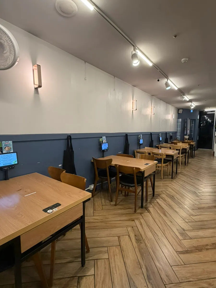 Interior of Deungchon Shabu Kalguksu Sangam Branch with many seats
