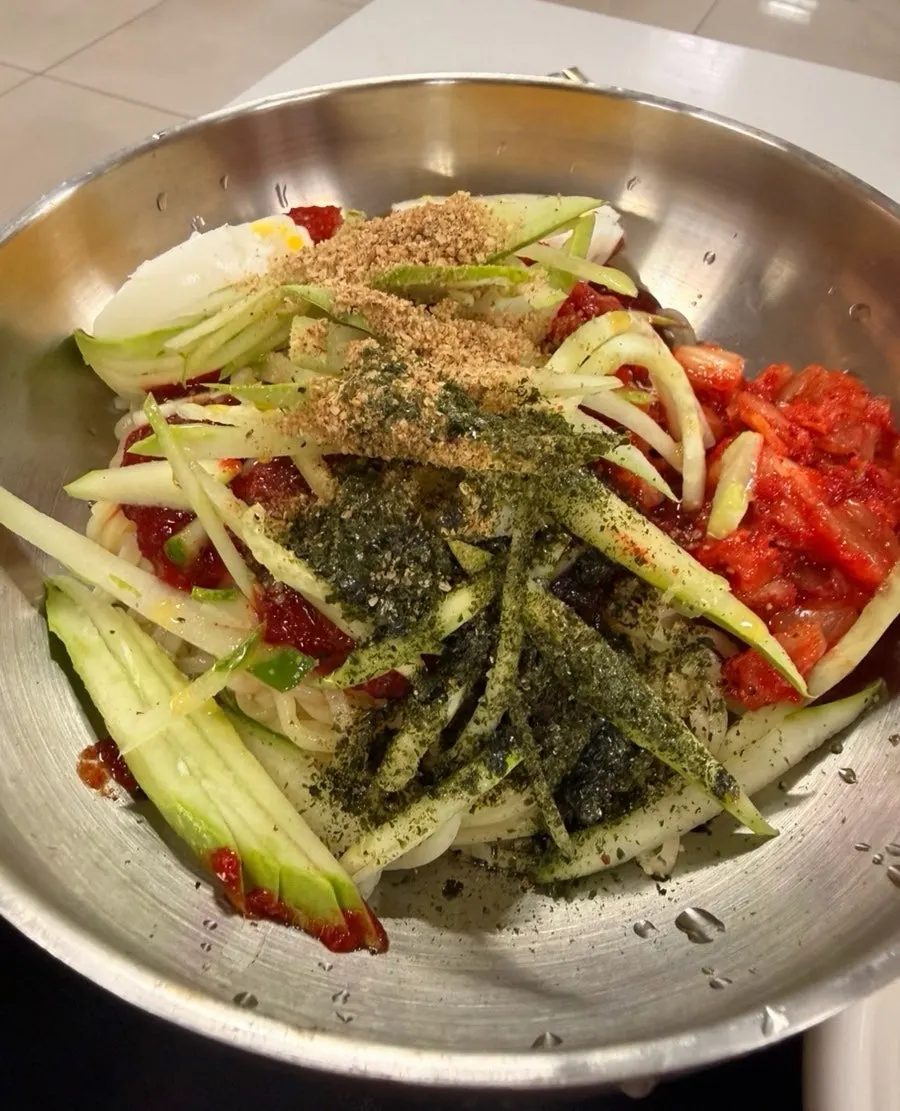 Mixed kimchi bibim guksu noodles