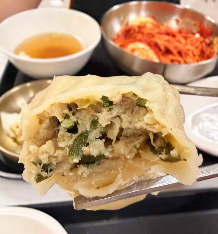 Cross-section of the mandu showing the packed meat-and-vegetable filling