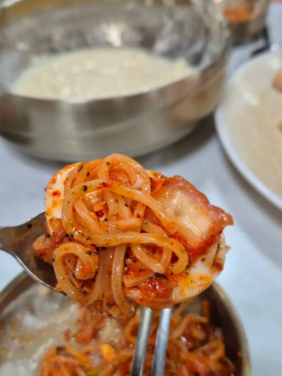 Bibim guksu noodles lifted up