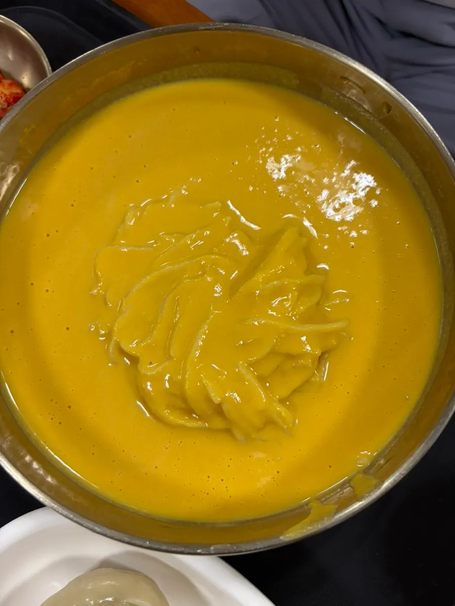 Close-up of the thick yellow pumpkin soy milk