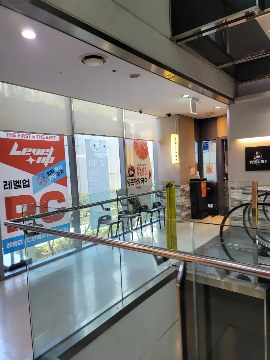 Entrance to Deungchon Shabu Kalguksu Sangam Branch on the 2nd floor of Woori Technology Building