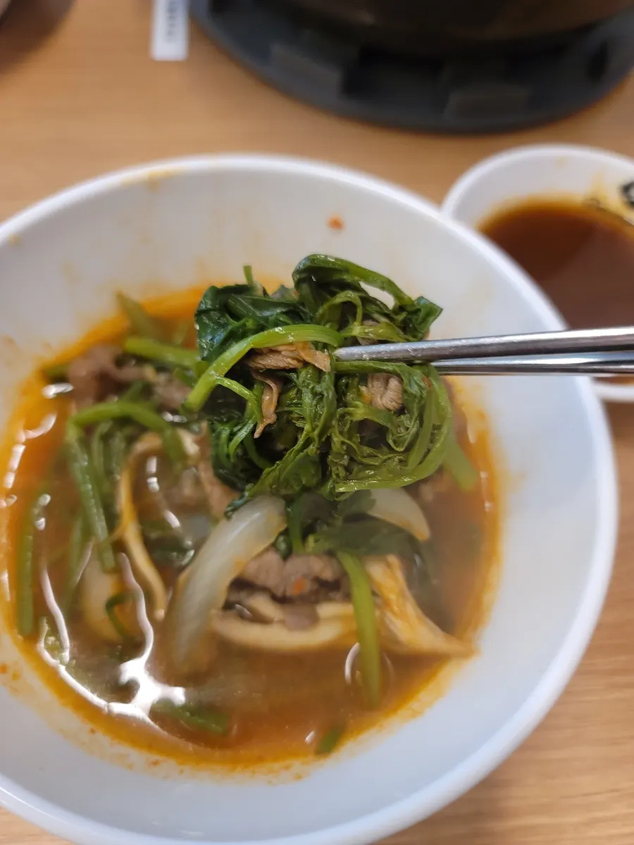 Beef and vegetables cooked in the spicy broth