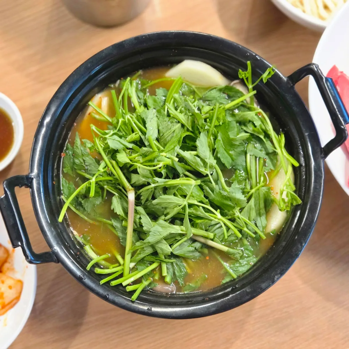 Main shot of the spicy shabu kalguksu at Deungchon Shabu Kalguksu Sangam Branch
