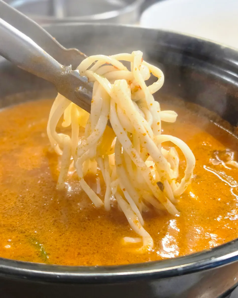 Pot of the richer, deepened spicy broth
