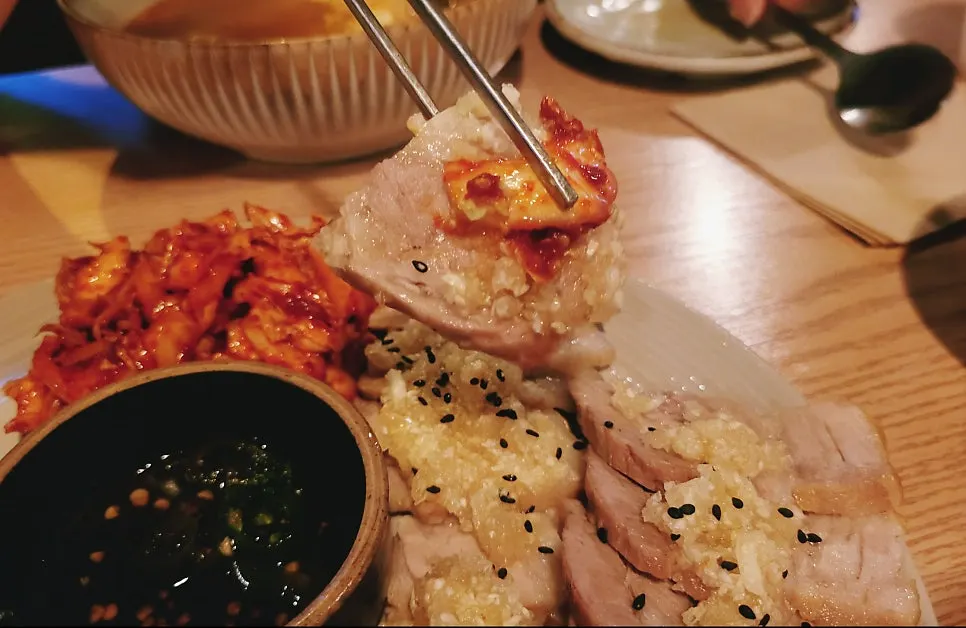 A piece of suyuk picked up with garlic