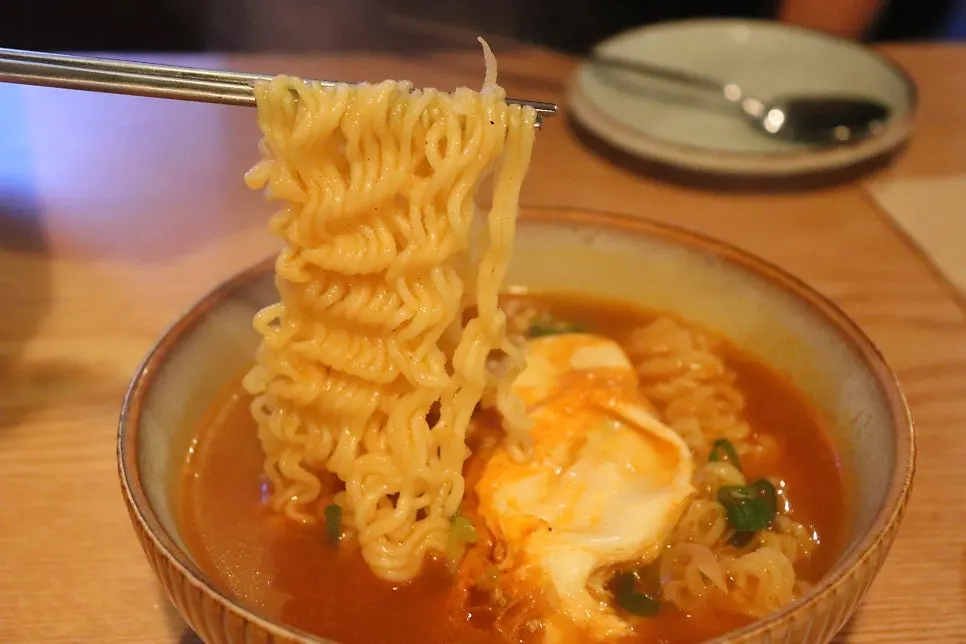 Close-up of the broth-filled ramyeon