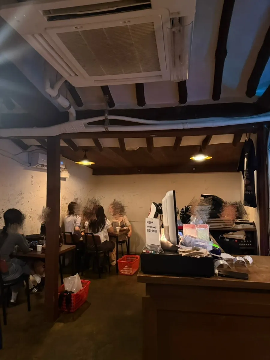 Main hall of Sangbong Dongseong-ro with many tables