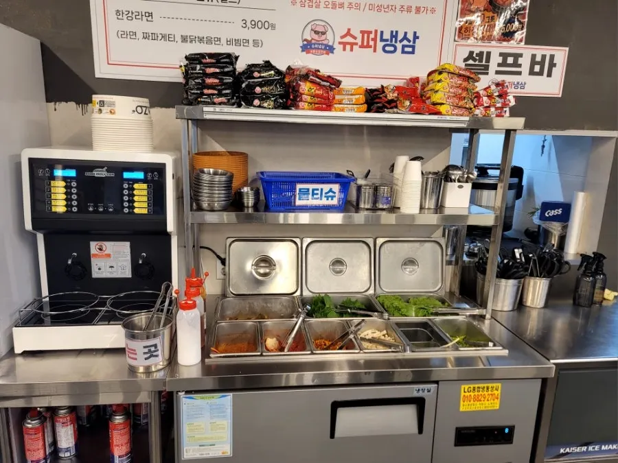 Menu listing frozen pork belly and Hangang ramyeon