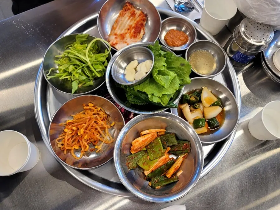 Noodles and soup base added into a ramyeon container