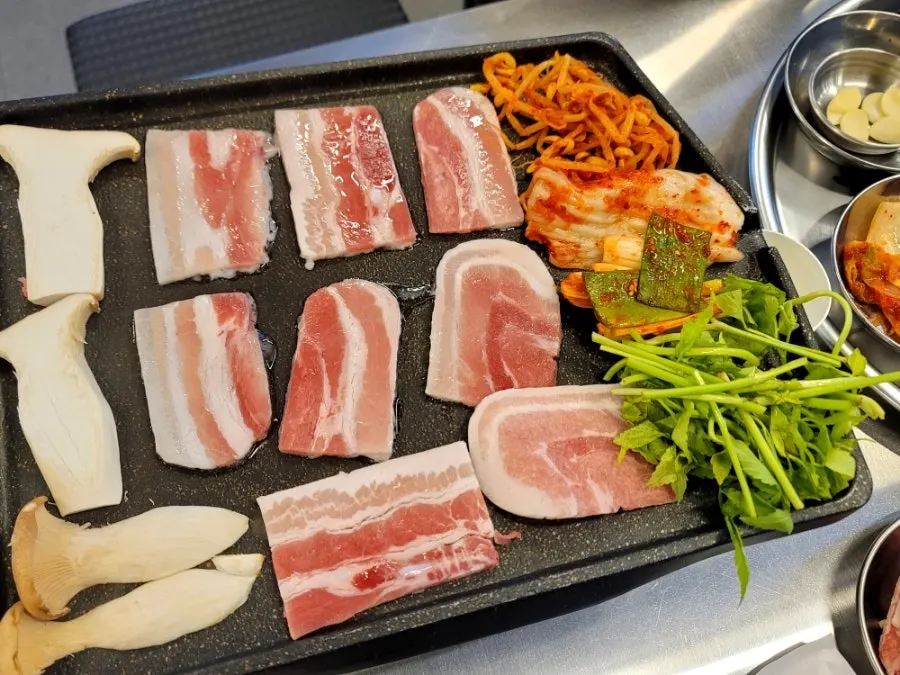 A plate piled high with frozen pork belly