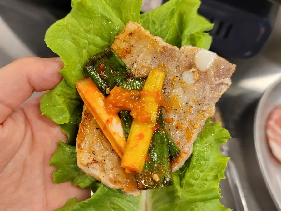 Close-up of frozen pork belly showing its fat ratio
