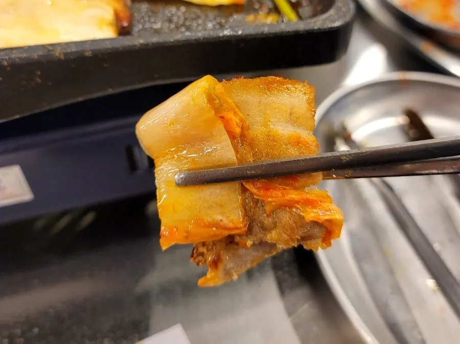 Grilled kimchi coated in meat fat