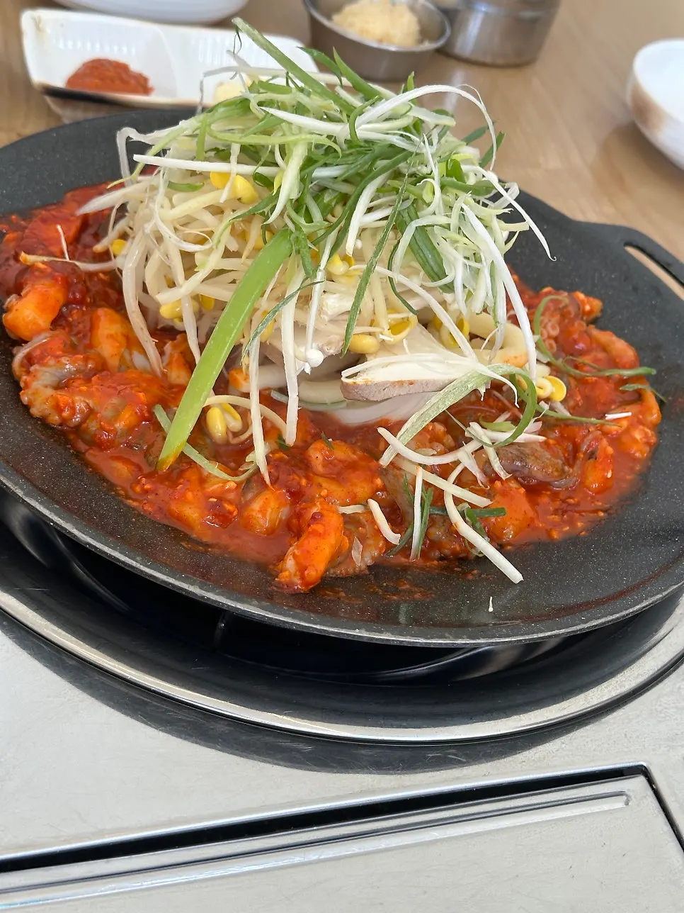 Jjukkumi hot plate bubbling as the sauce soaks in