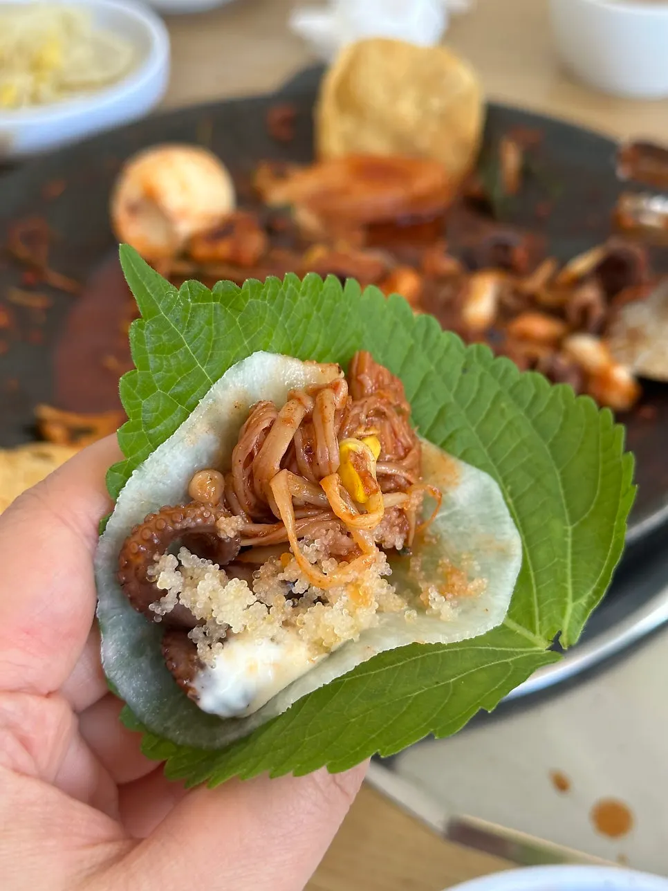 Perilla leaf wrap with jjukkumi and flying fish roe