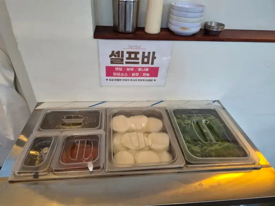 Self-serve side bar set up in one corner of the restaurant